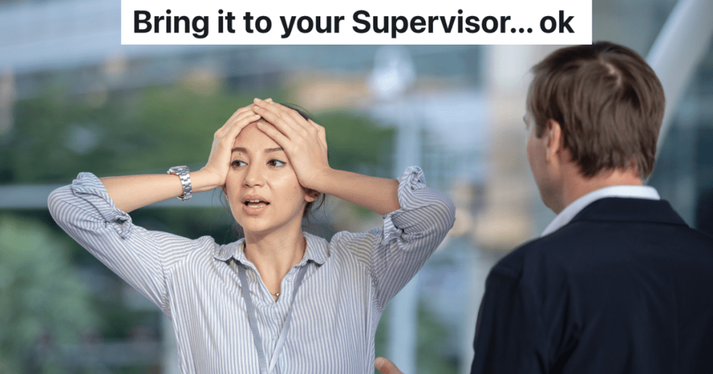 businessman talking to stressed out woman