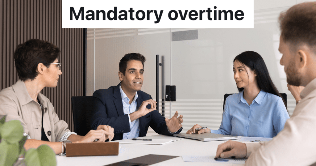 four business professionals in a meeting