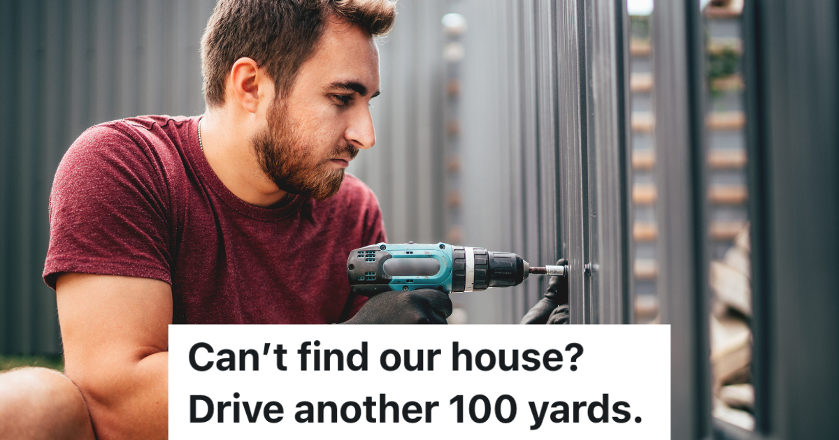 man installing a fence