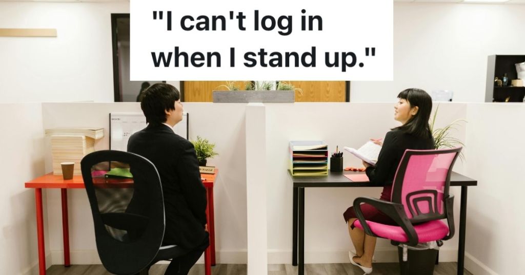 Two office workers looking at each other in their office chairs
