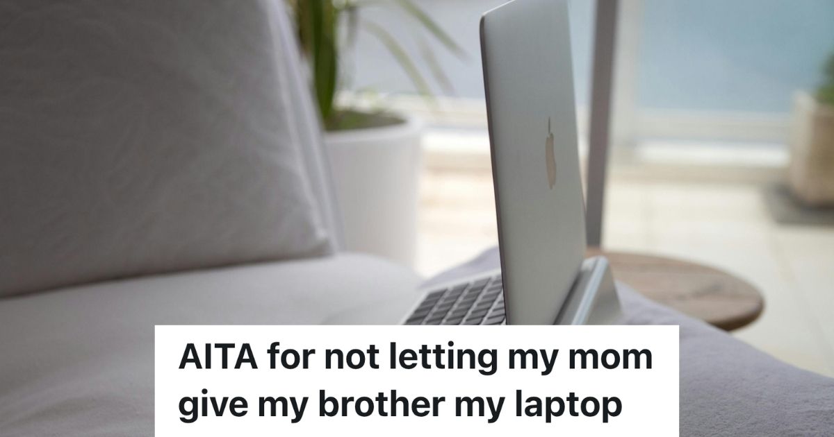 An open laptop on a couch