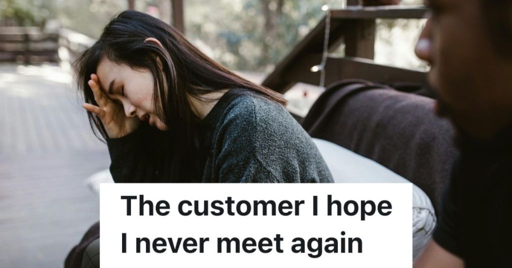 Woman looking sad with her hand on her face