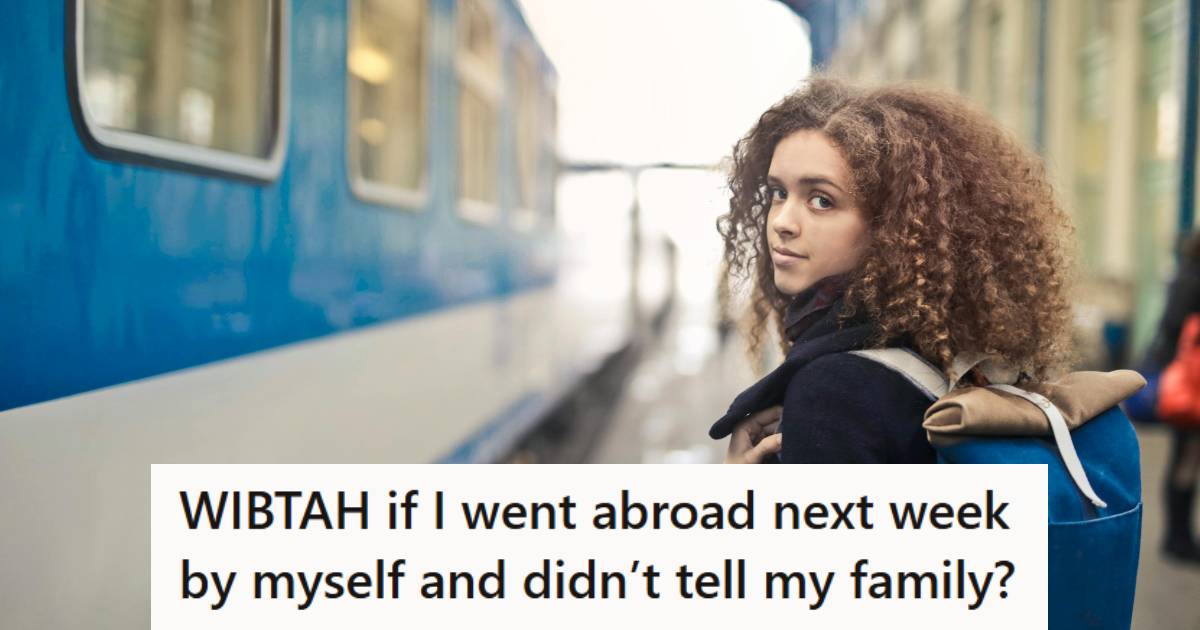Woman with curly hair getting ready to board a train