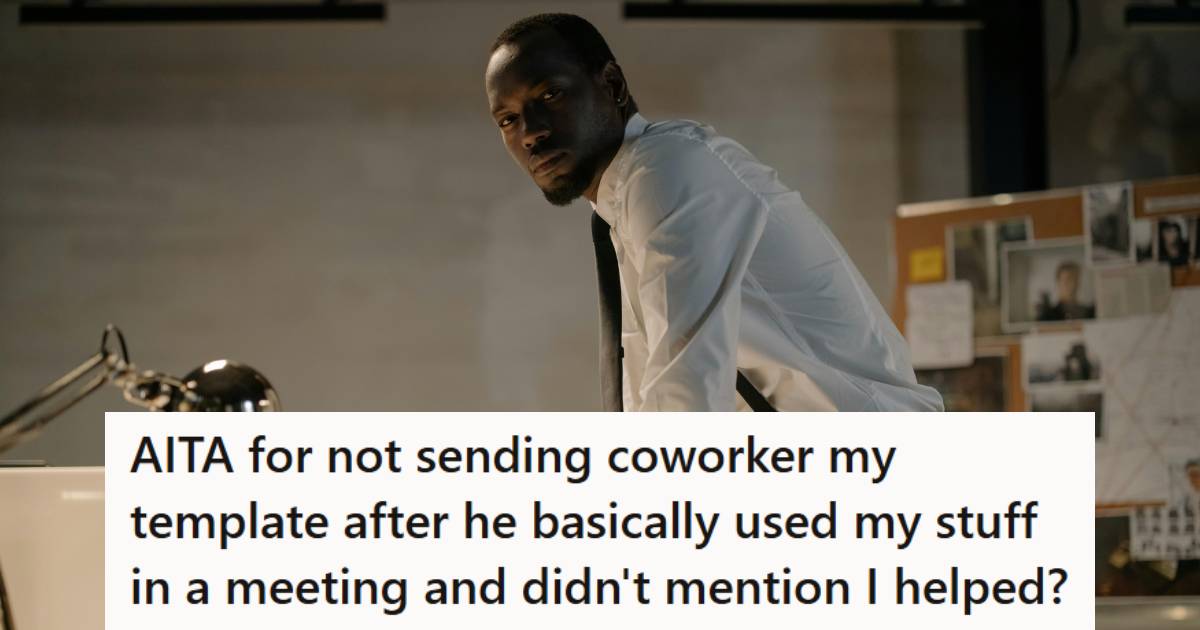 Man standing at his desk being frustrated over a lying coworker