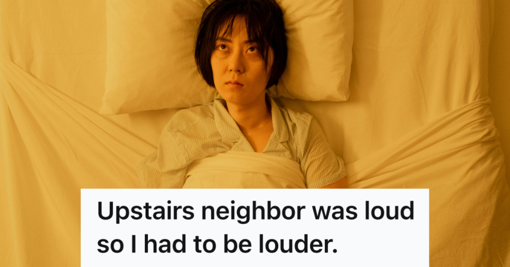 annoyed woman laying awake in bed