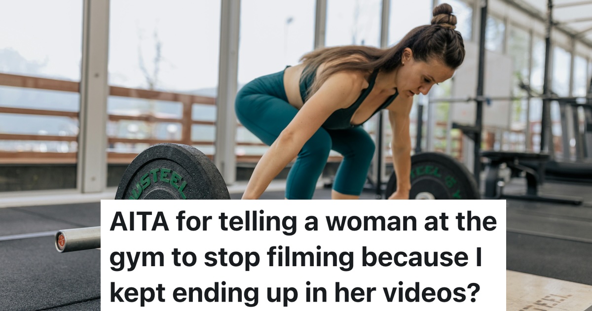 woman lifting heavy weights at the gym