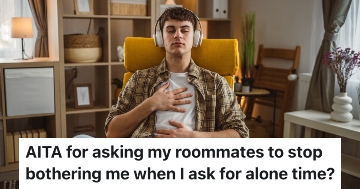 man listening to his headphones