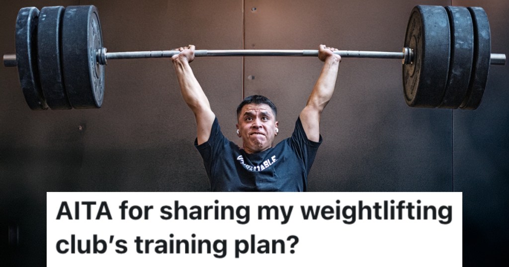 man lifting a barbell