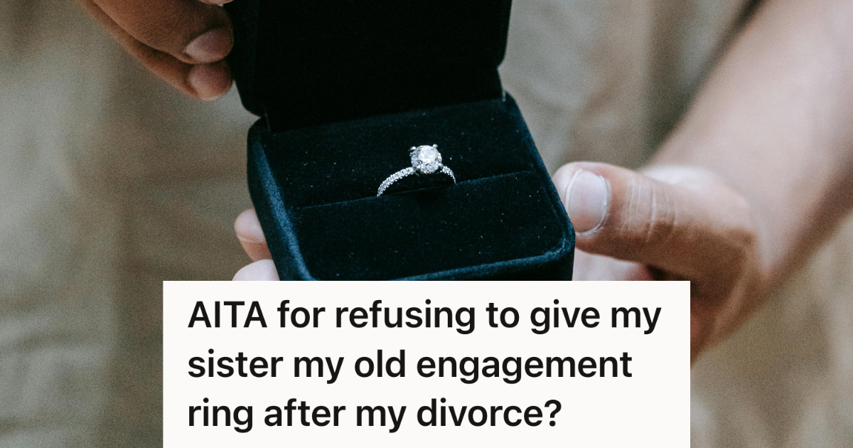 man holding an engagement ring in a black box