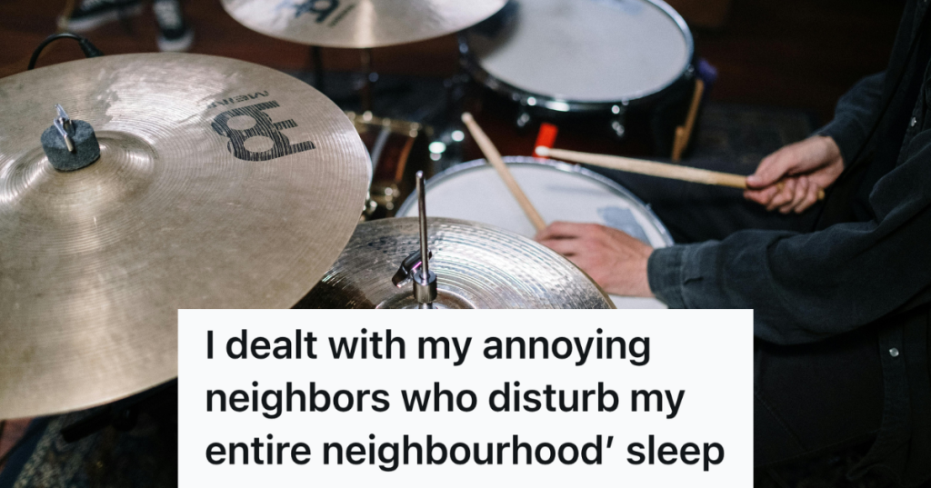 man playing a drum kit