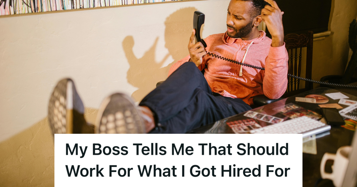 man putting his feet up on the desk