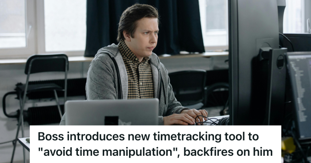 man scowling at his computer screens