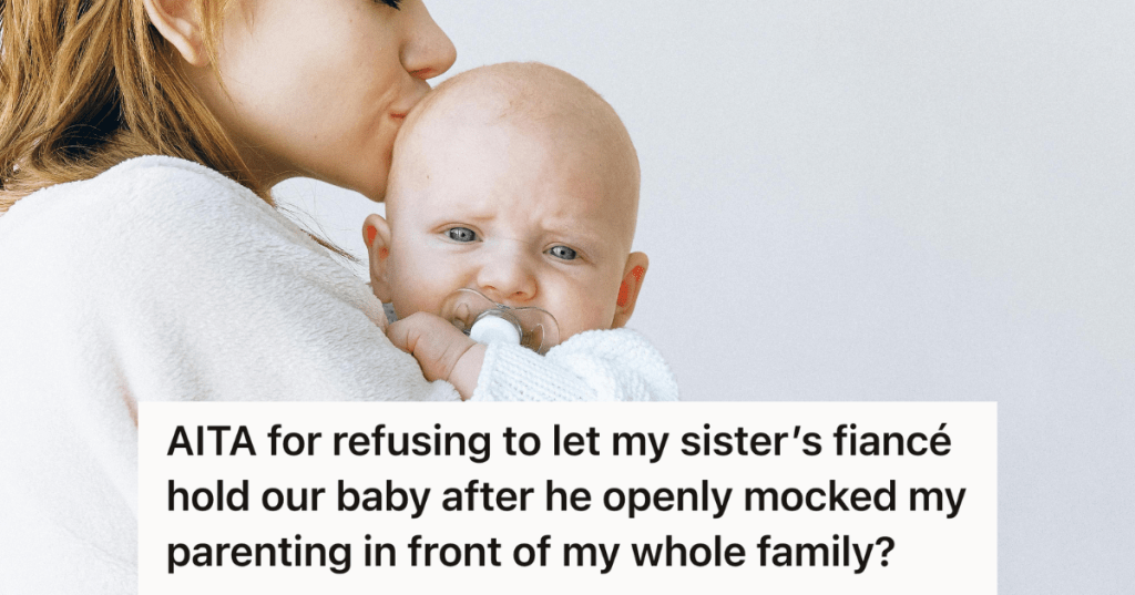 mother kissing her infant child