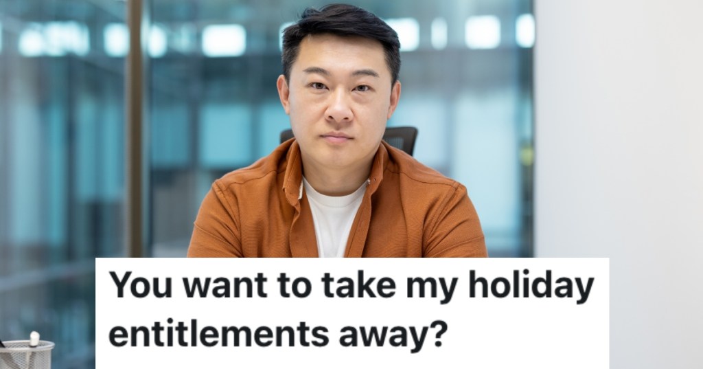 man sitting at a desk