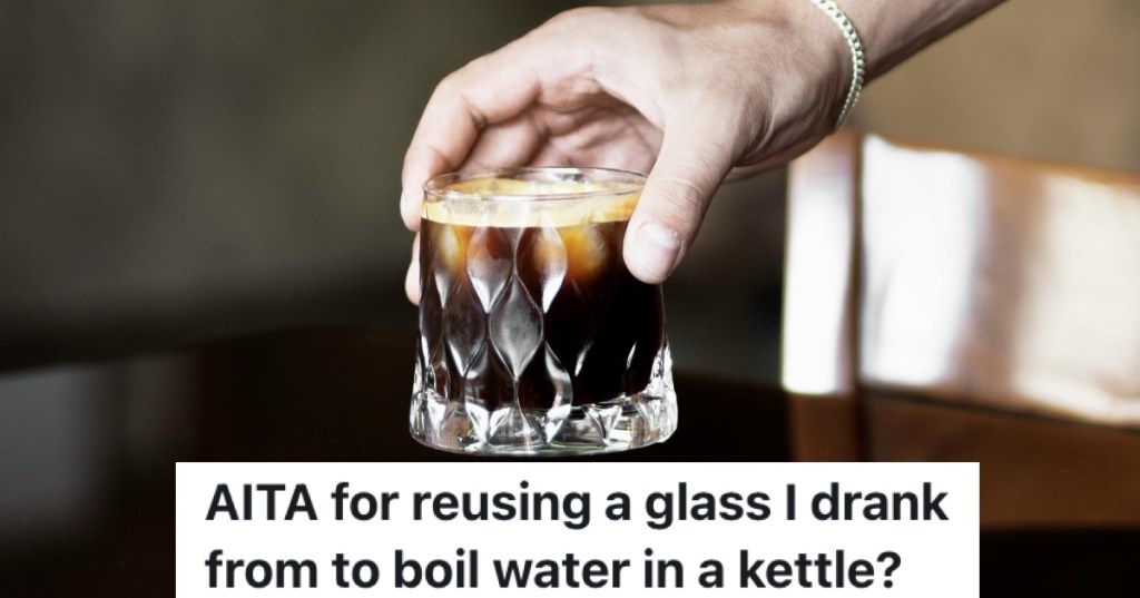 man drinking out of a cut glass tumbler