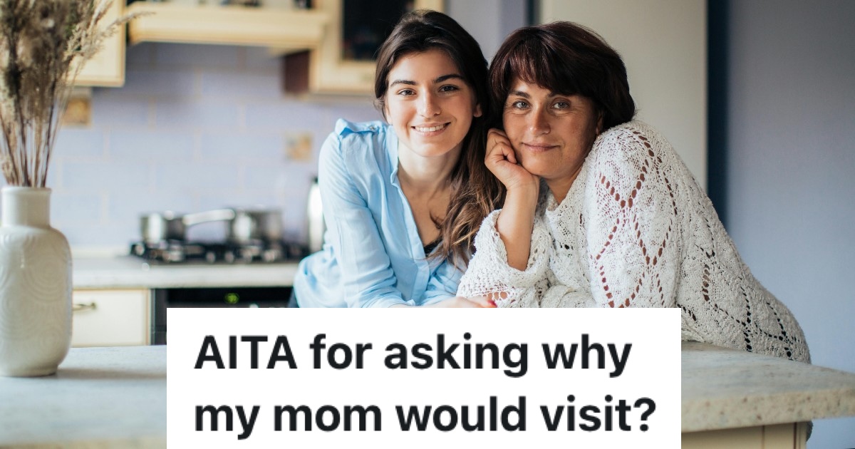 mother and daughter smiling at the camera