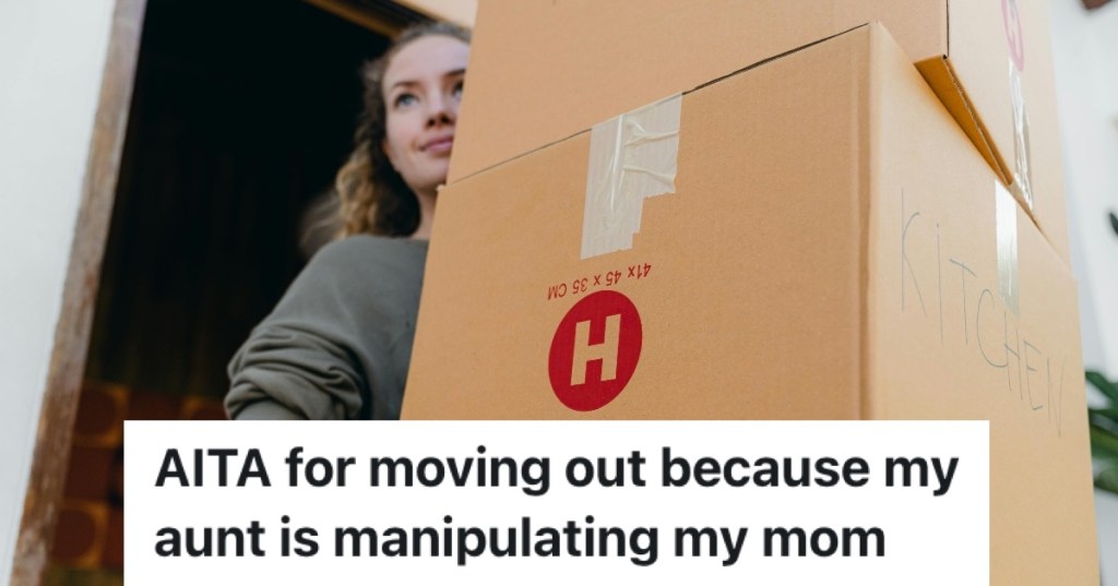 girl carrying moving boxes