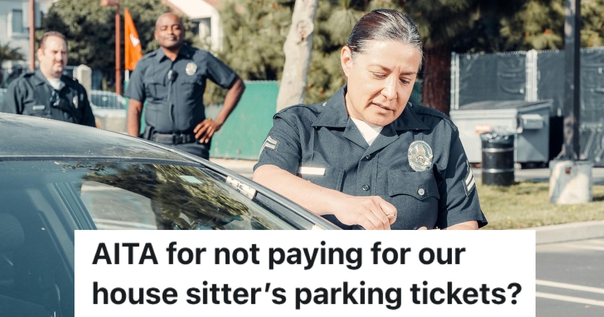 officer writing a parking ticket