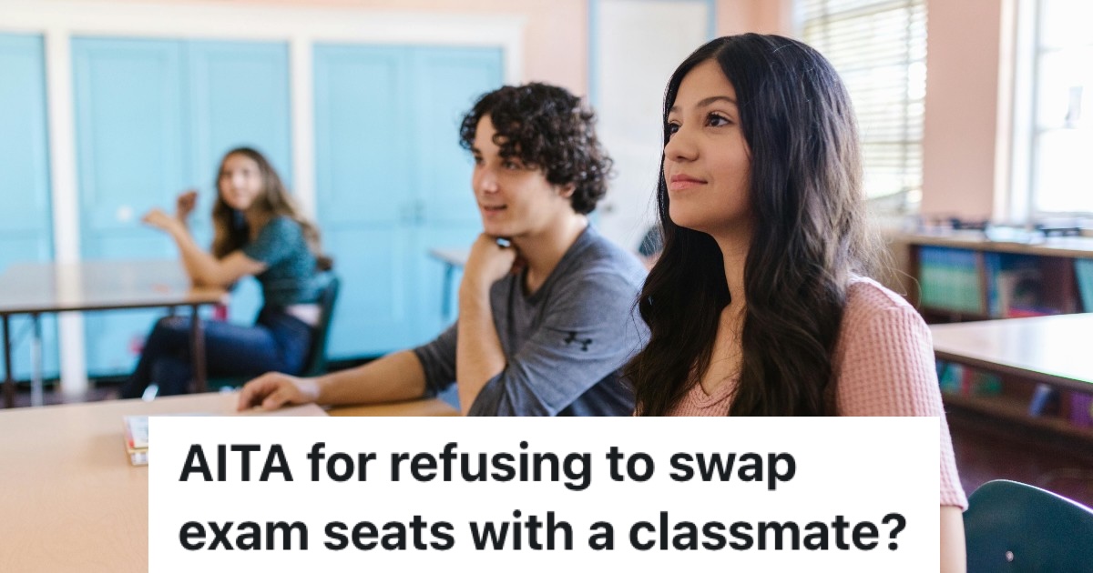 students at desks in a lecture hall