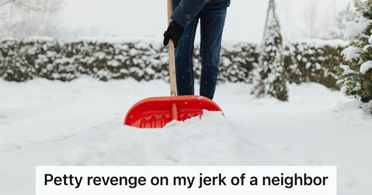 shoveling snow with red shovel