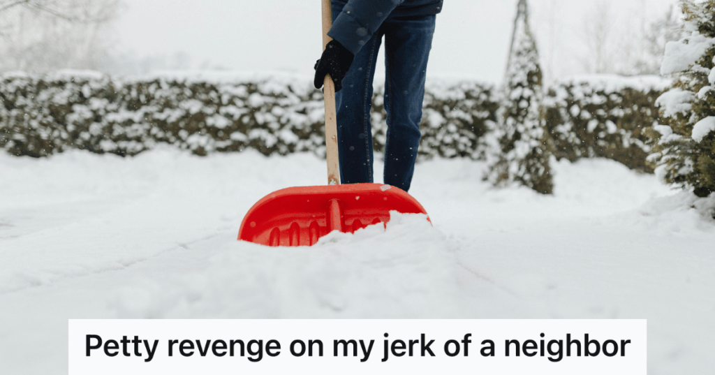 shoveling snow with red shovel