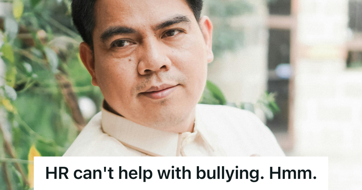 smirking man in white shirt