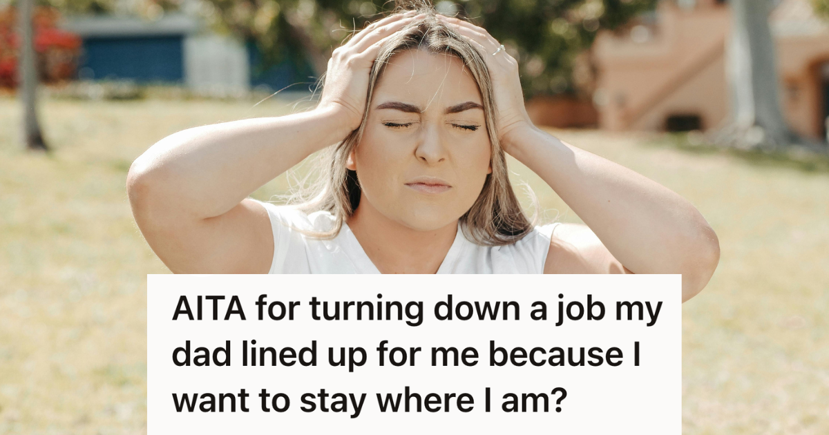 stressed woman with hands over head