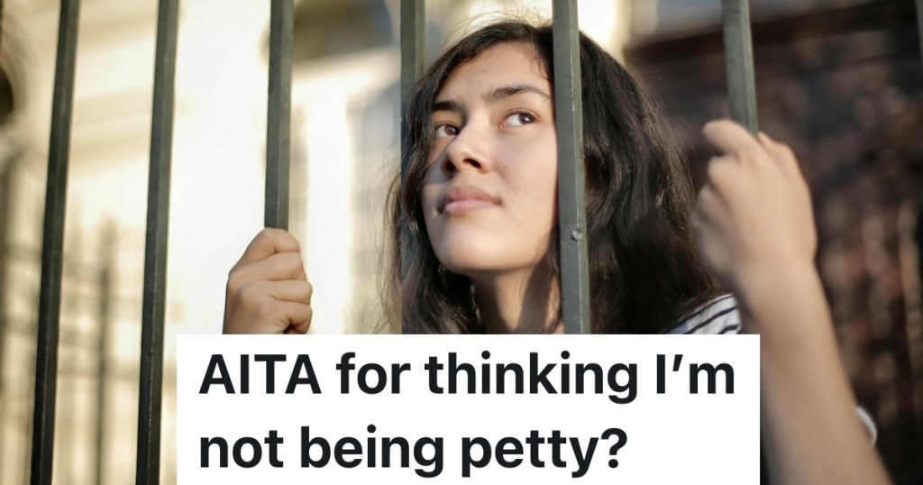 teen girl hanging on bars in playground