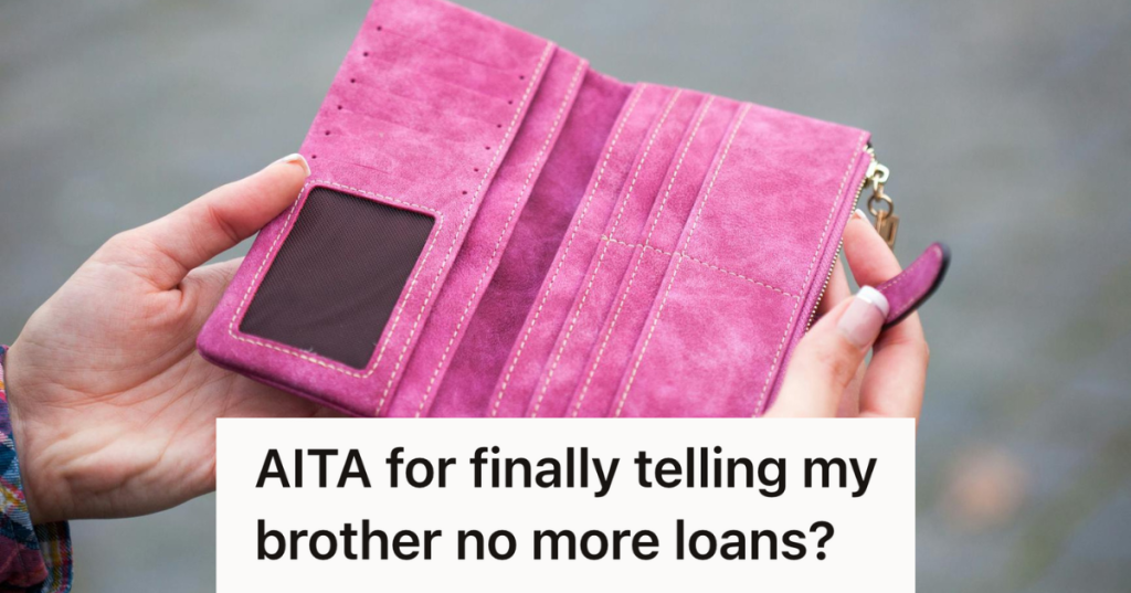 woman opening up a pink wallet