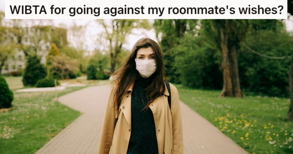 A woman wearing a face mask in a deserted park