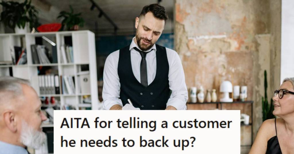 Male server waiting on a table at a local restaurant