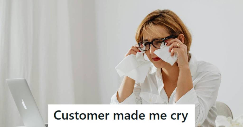 Woman crying at her desk over a story she heard
