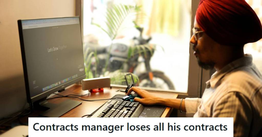 Contracts manager on his computer in the morning