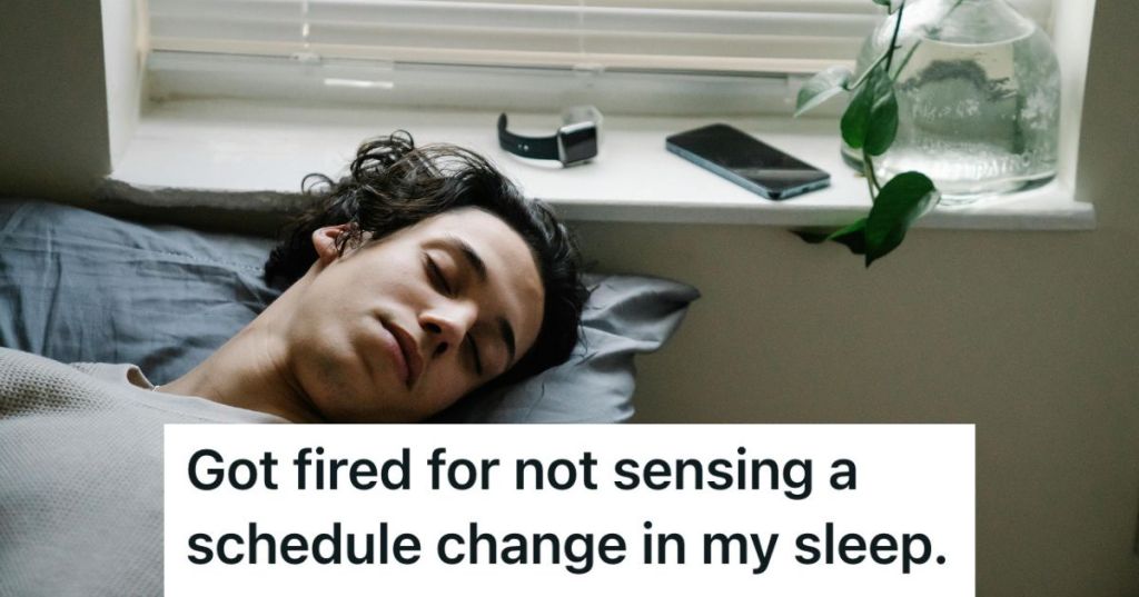 Man sleeping next to his phone