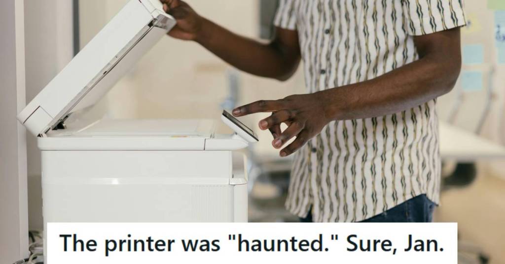 IT tech support worker fixing a printer in a law office