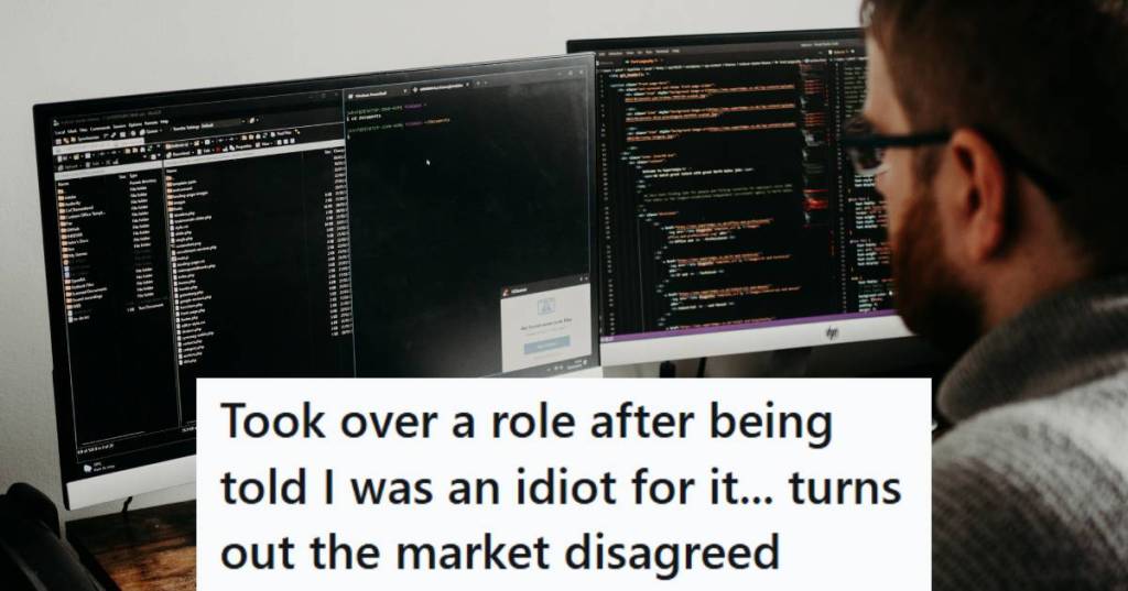 Software engineer working on his computers