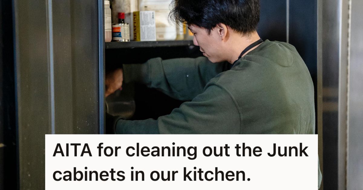 Man reaching into a full kitchen cabinet