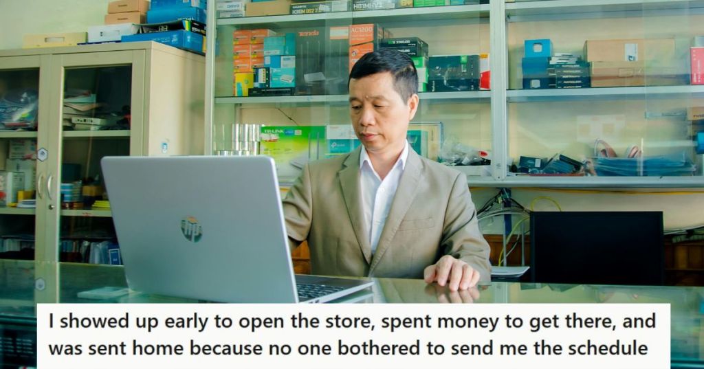 Man in brown coat working at a store