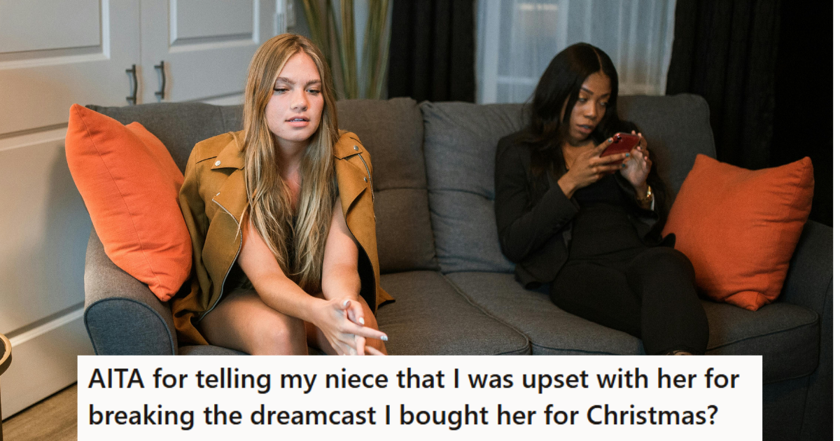 Two women sitting on a couch 