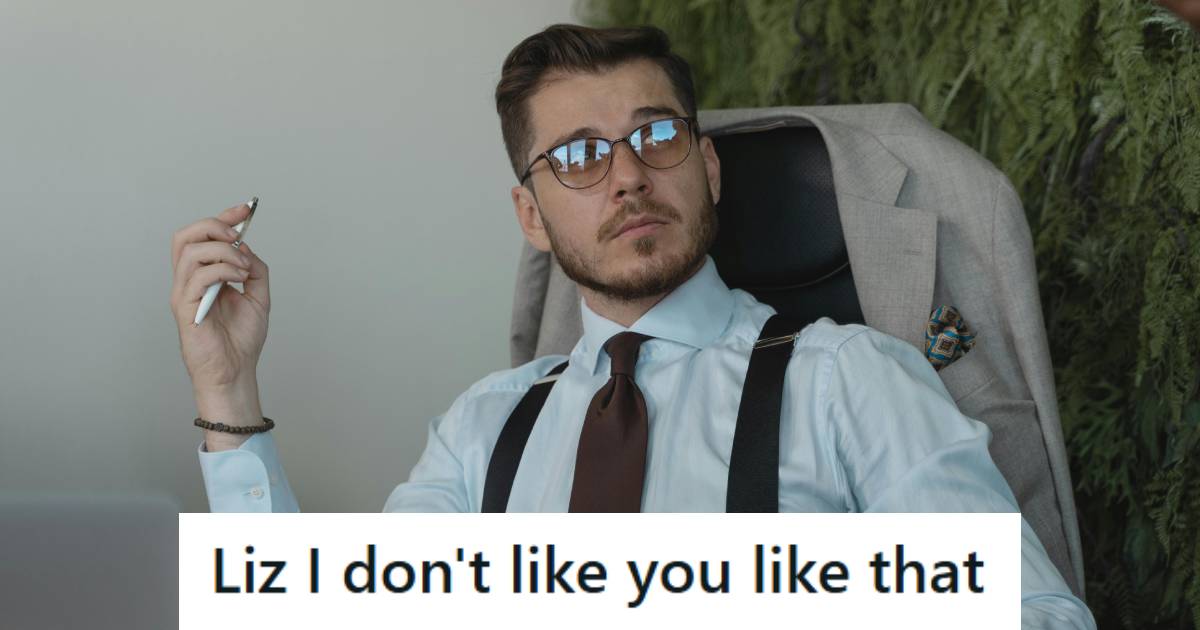 It support worker sitting at his desk annoyed by a coworker