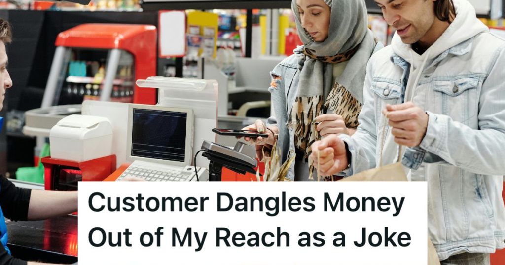 Couple paying for groceries