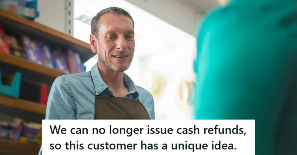 Man cashier helping a customer with a refund