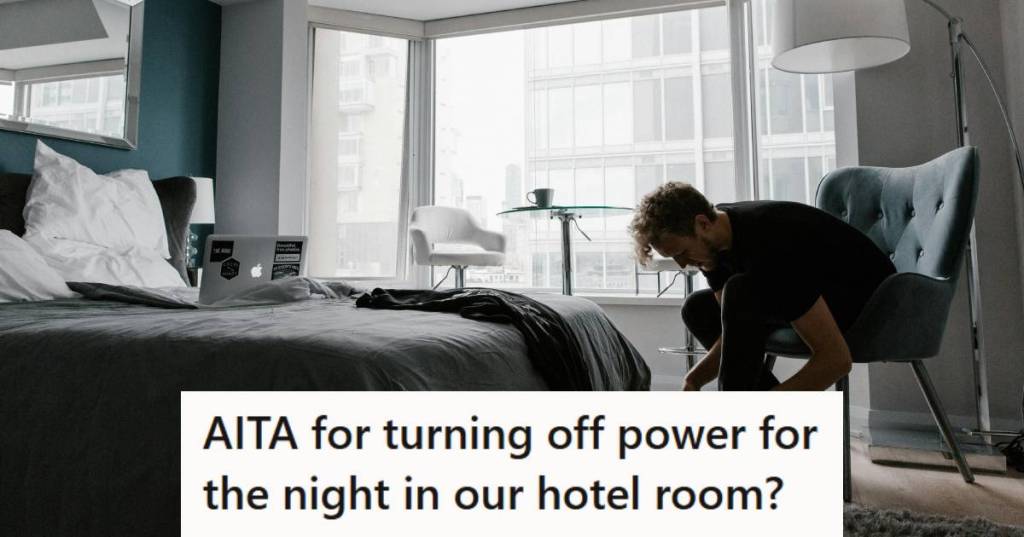 Man putting his shoes on in a hotel room