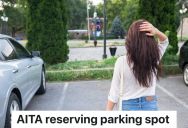 Man Tries To Park In An Open Spot, But A Woman Is Standing In There Claiming She’s Reserving It For Her Husband