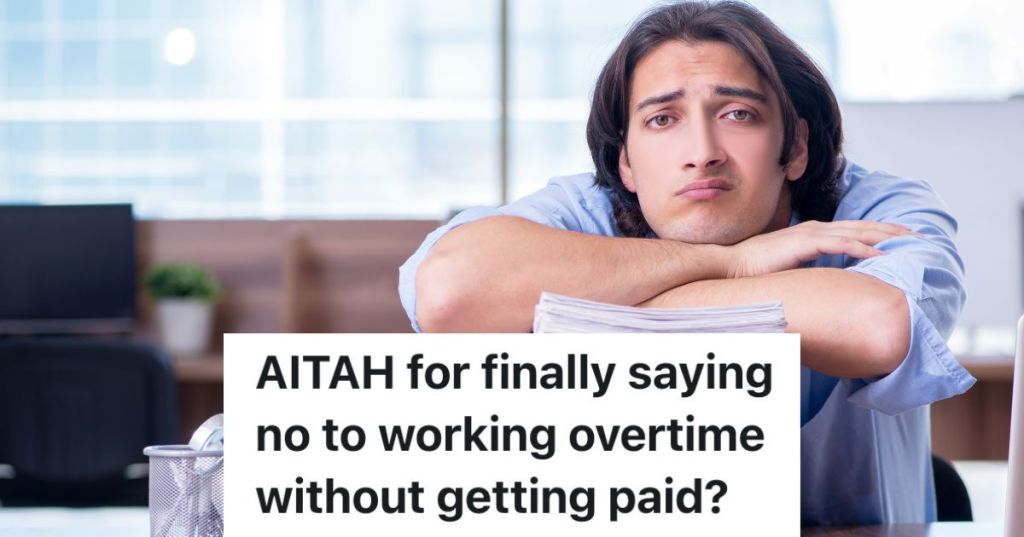 frustrated man resting his head on a huge stack of paperwork