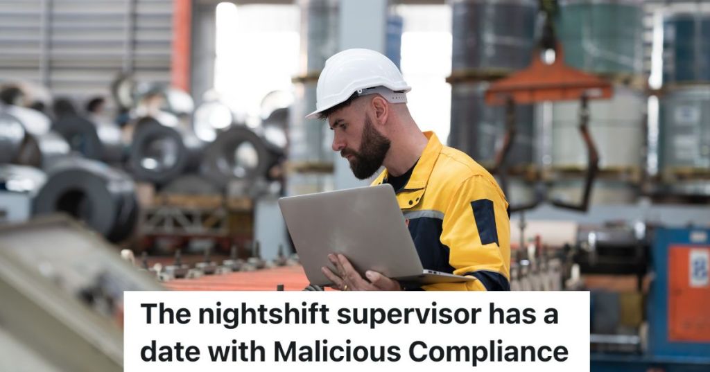 man in white hard hat looking at assembly line machinery in a factory