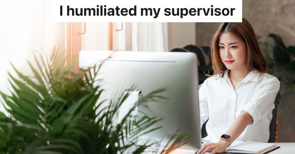 confident businesswoman looking at her computer