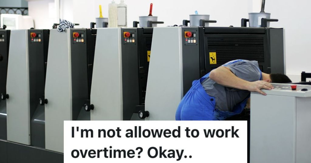 man repairing printing equipment