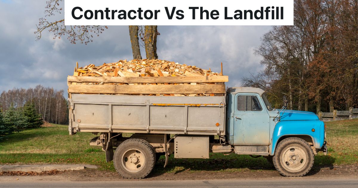 Construction Demolition Requires Contractor To Take Lots Of Treated Wood To The Landfill, But The Bin To Put The Wood In Is Really Small dump truck full of wood