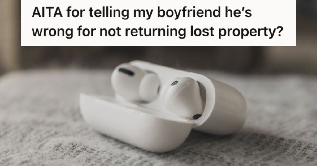 A pair of Airpods on its case